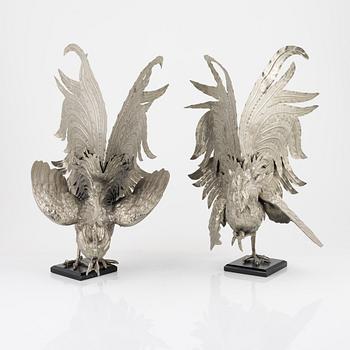 A pair of metal table decorations, 20th century.