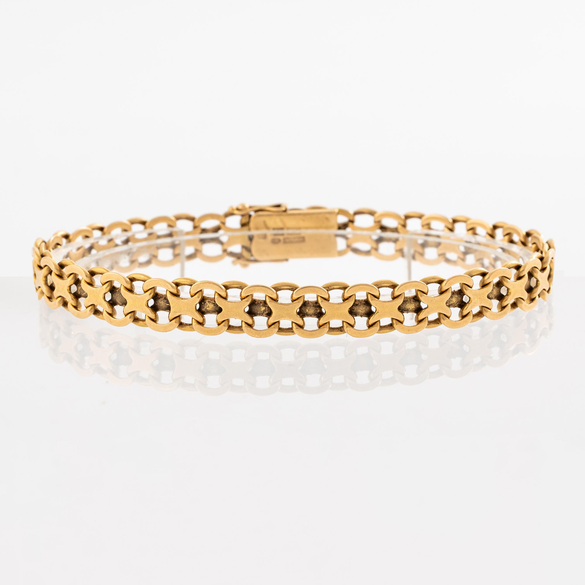 Bracelet. 18K gold, x-link.