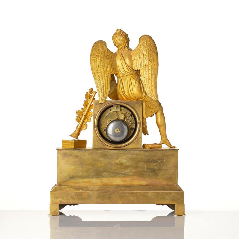 A figural Empire ormolu mantel clock, Paris, early 19th century.