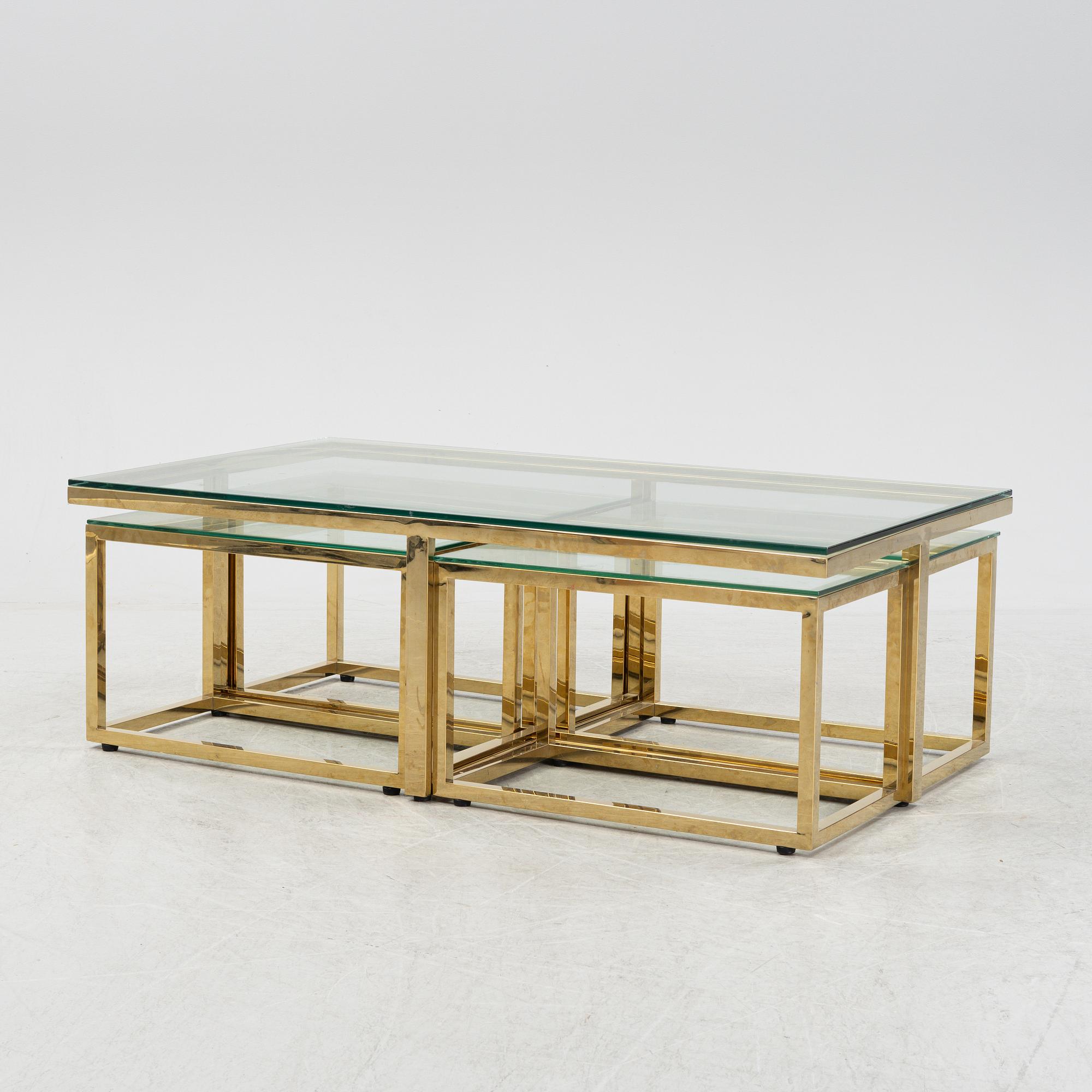 A 21st Century 5 pcs glass coffee table.
