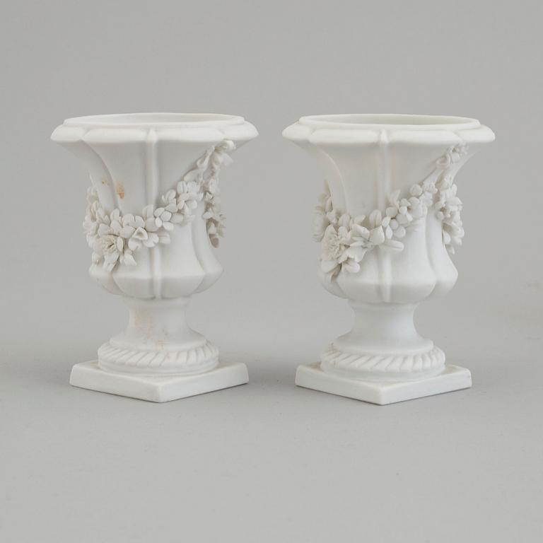 Six bisquit porcelain miniture vases, circa 1900, with Sevres like mark.