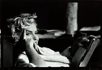 75. Elliott Erwitt, "Marilyn Reading, New York, 1956".