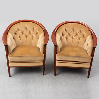 A pair of mahogany 'Fabiola' armchairs from Bröderna Andersson, second half of the 20th Century.