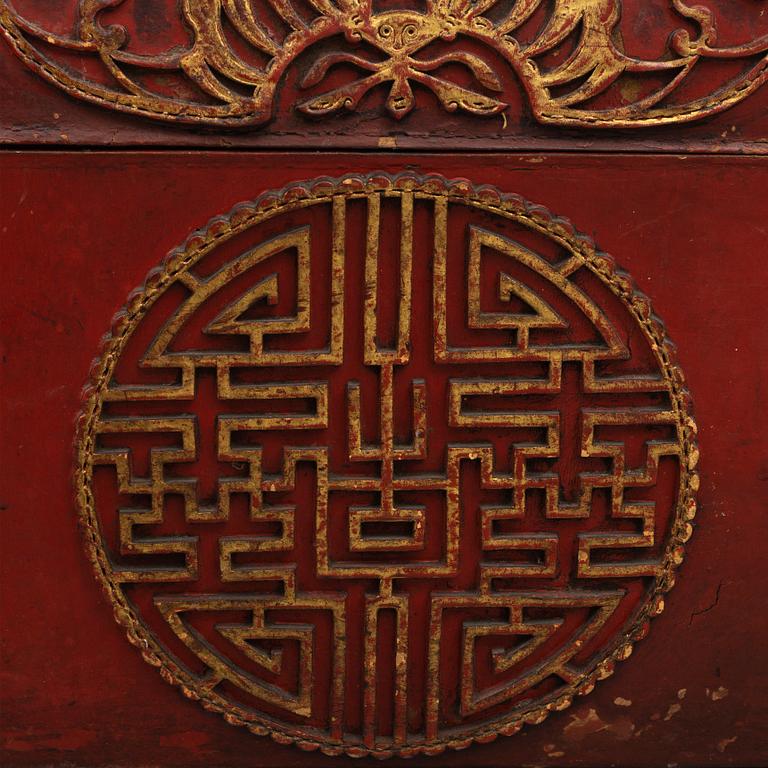 A Chinese red leather and wooden box, 20th century.