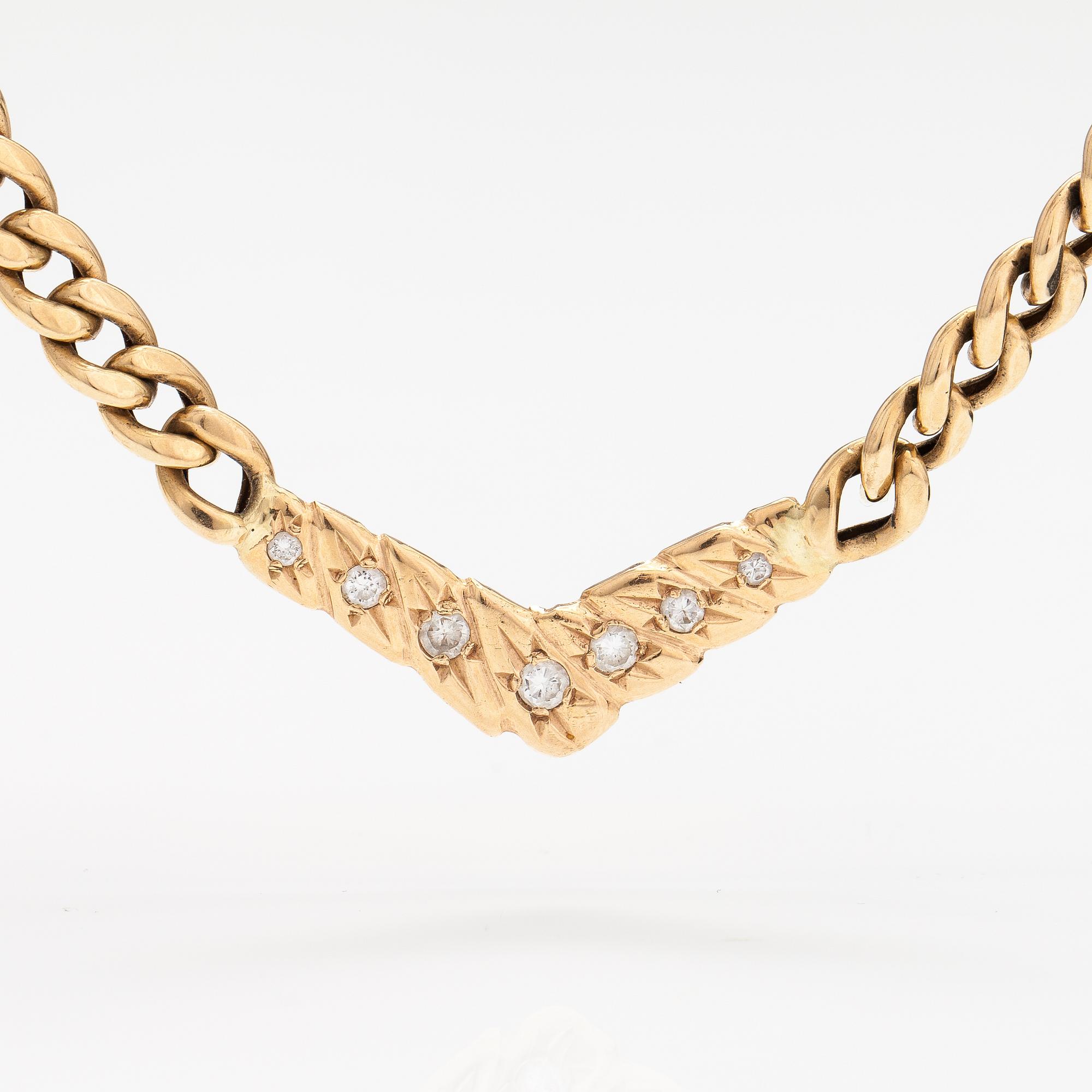 A 14K gold necklace with diamonds ca. 0.46 ct in total. With certificate.