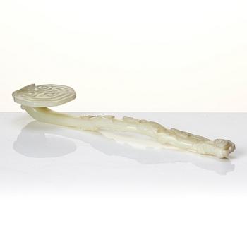 A pale celadon ruyi sceptre, Qing dynasty, 19th century.