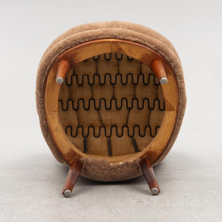A mid 20th century easy chair,.