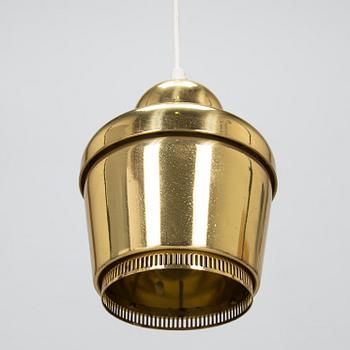 Alvar Aalto, a 'Golden bell' ceiling pendant light, model "A 330", Valaisinpaja Oy Finland.