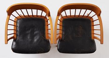 Josef Frank, a pair of mahogany and black leather 'Captain's chair', Svenskt Tenn, model 789B, acquired in 1950.