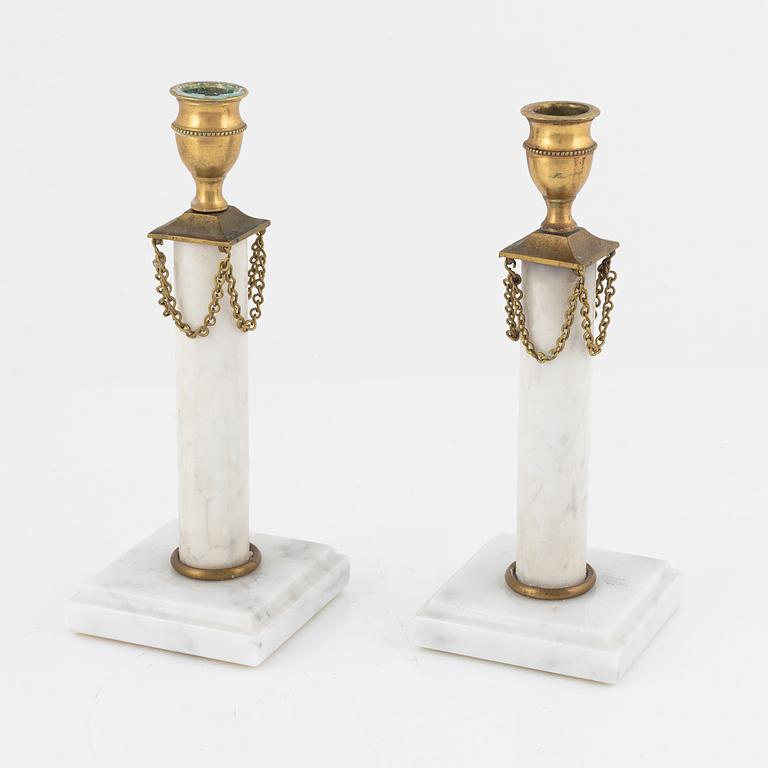 A pair of Gustavian style candlesticks, circa 1900.