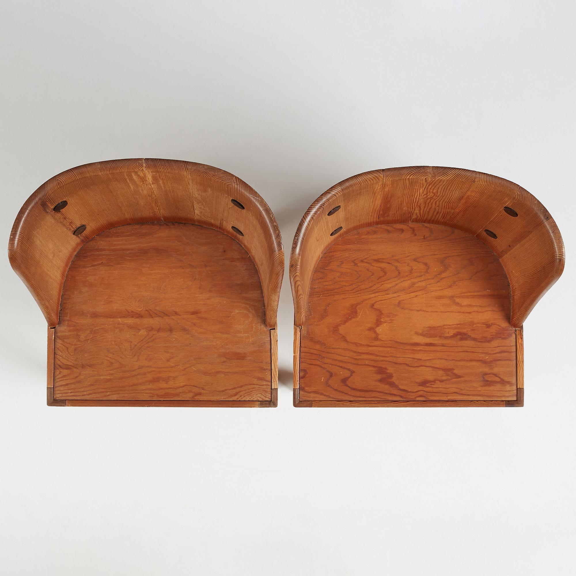 Axel Einar Hjorth, a pair of stained pine 'Lovö' chairs, Nordiska Kompaniet, Sweden 1930s.
