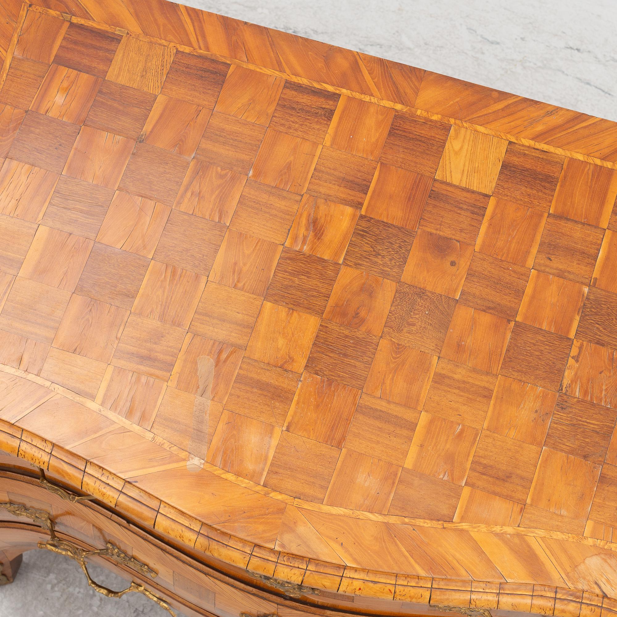 A Swedish rococo parquetry commode, later part 18th century.