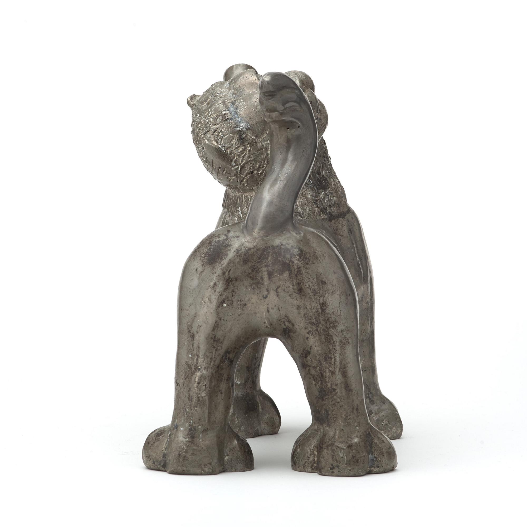 Anna Petrus, a pewter flask in the shape of a lion, Herman Bergman, Stockholm 1920's.