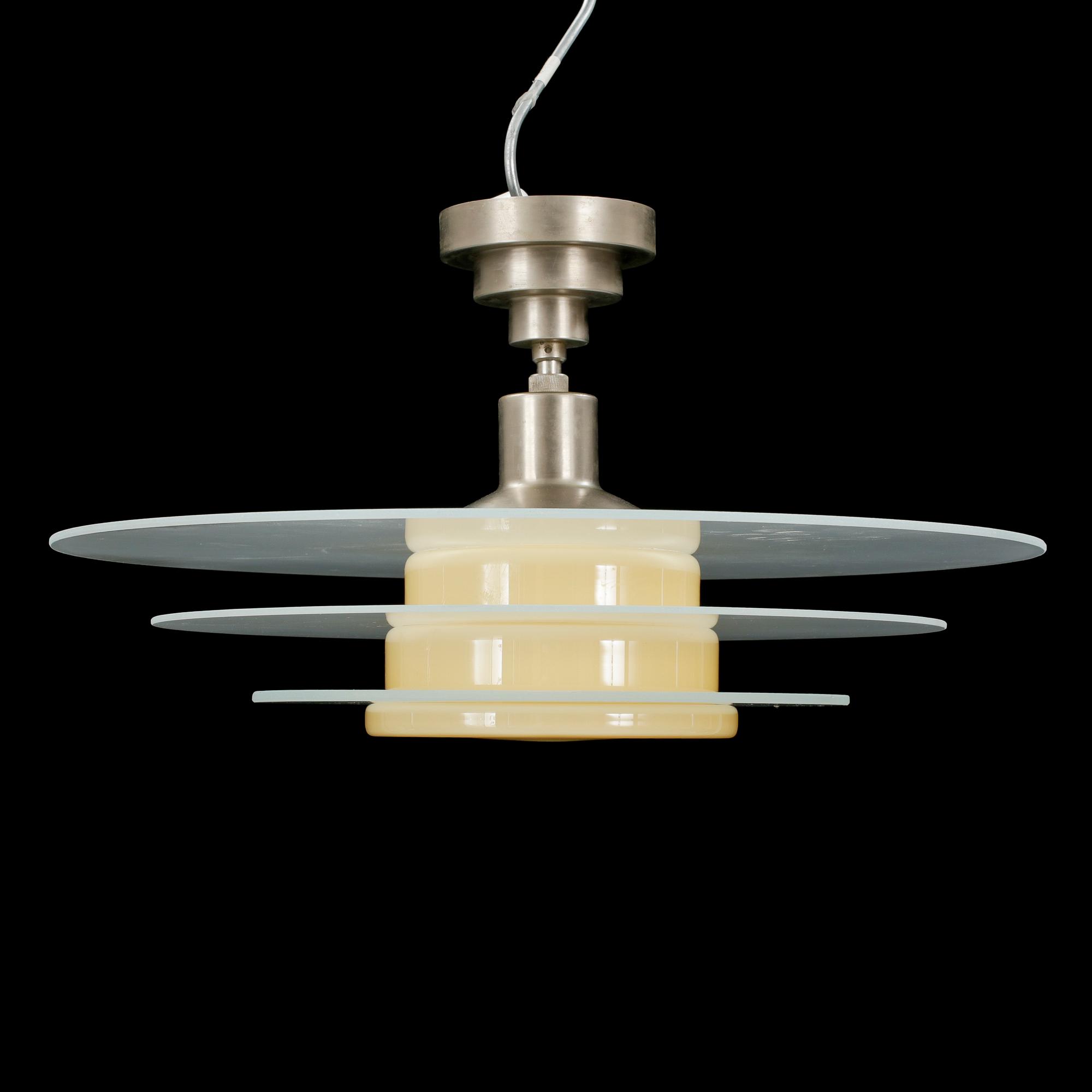 TAKLAMPA, Saturnusmodell, 1900-talets första hälft.