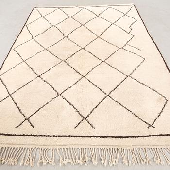 A Moroccan carpet approx 286x226 cm.