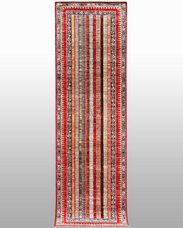 A runner carpet, Khorjin, ca 310 x 83 cm.