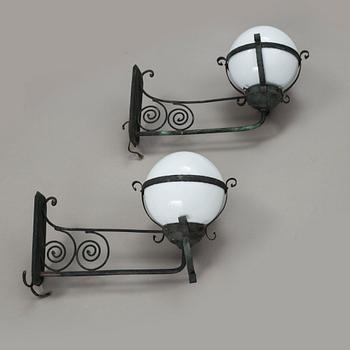 A pair of 1920's copper and glass outdoors wall lights.