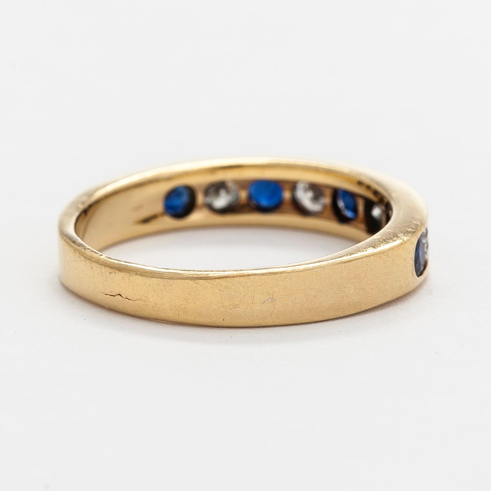 Ring, 18K guld, diamanter och safirer.