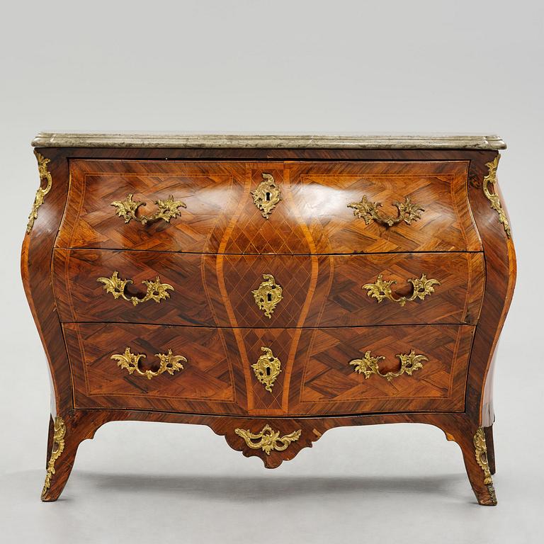 A Swedish rococo parquetry commode attributed to J. Noraeus (master in Stockholm 1769-81).
