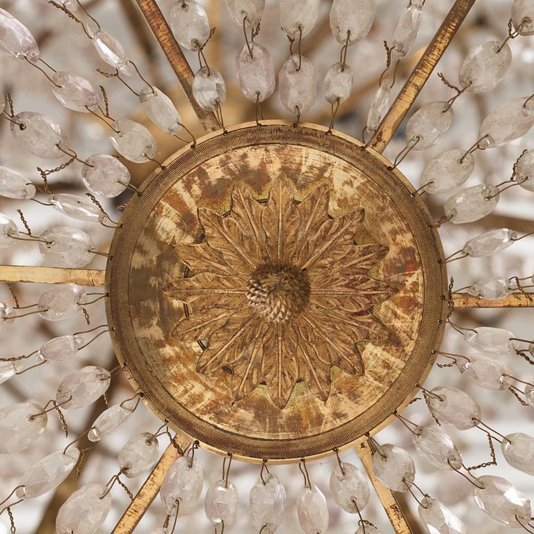 A late Gustavian gilt brass and cut glass seven-light chandelier, Stockholm, late 18th century.