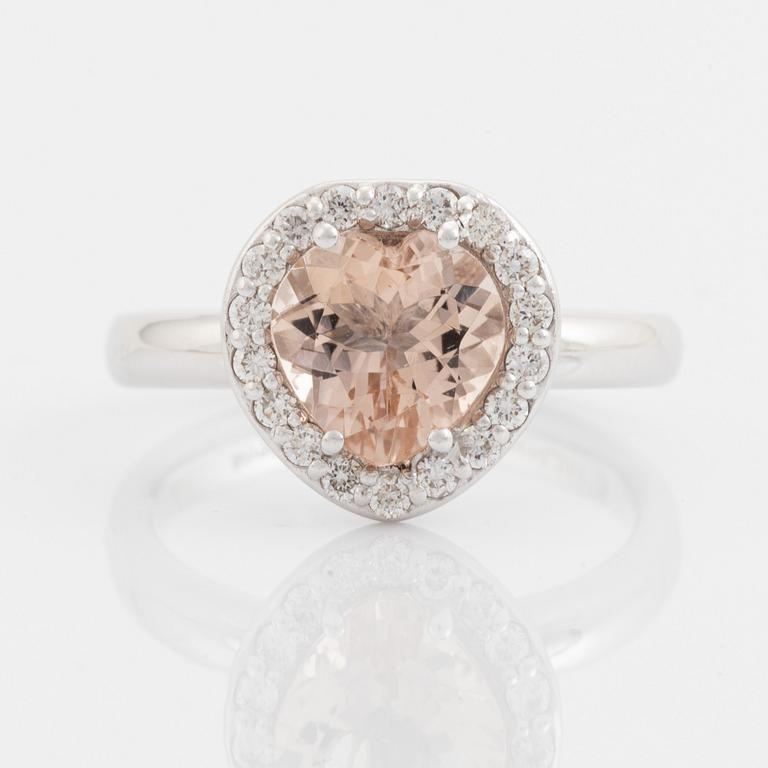 Heart shaped morganite and brilliant cut diamond ring.