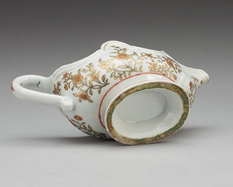 A rouge de fer and gold sauce boat, Qing dynasty, Qianlong (1736-95).