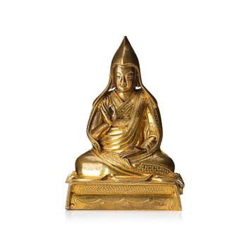 A gilt bronze sculpture of a Lama, Tibet, 18th century.