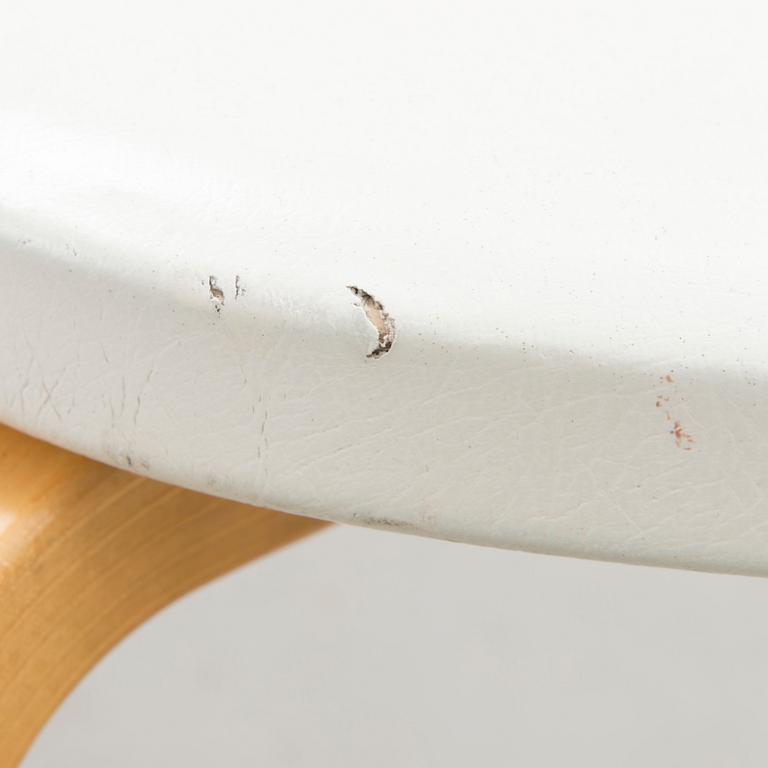 A pair of chairs model 69, Artek, late 20th Century. Design year 1935.