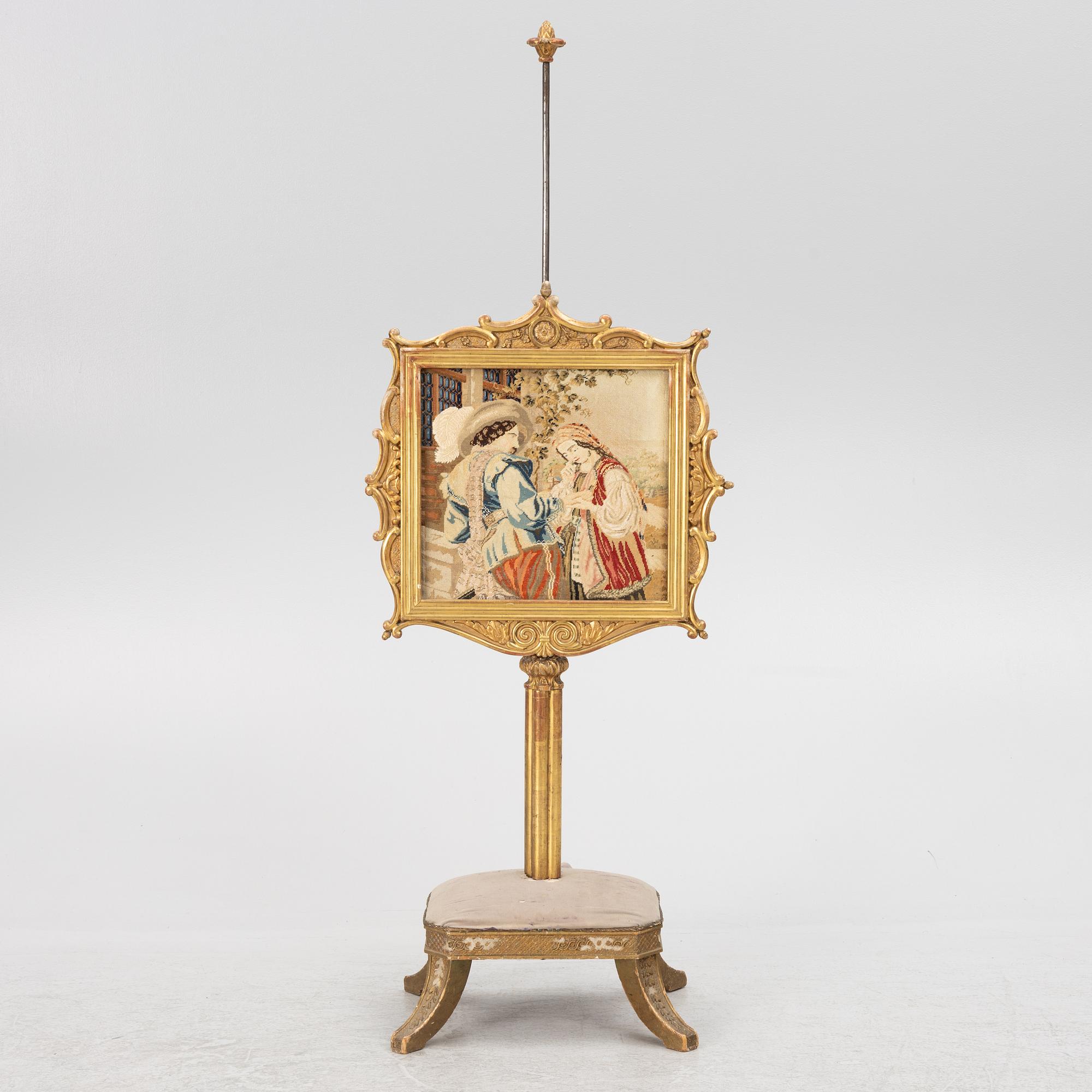 Brasskärm med fotpall, omkring 1900.