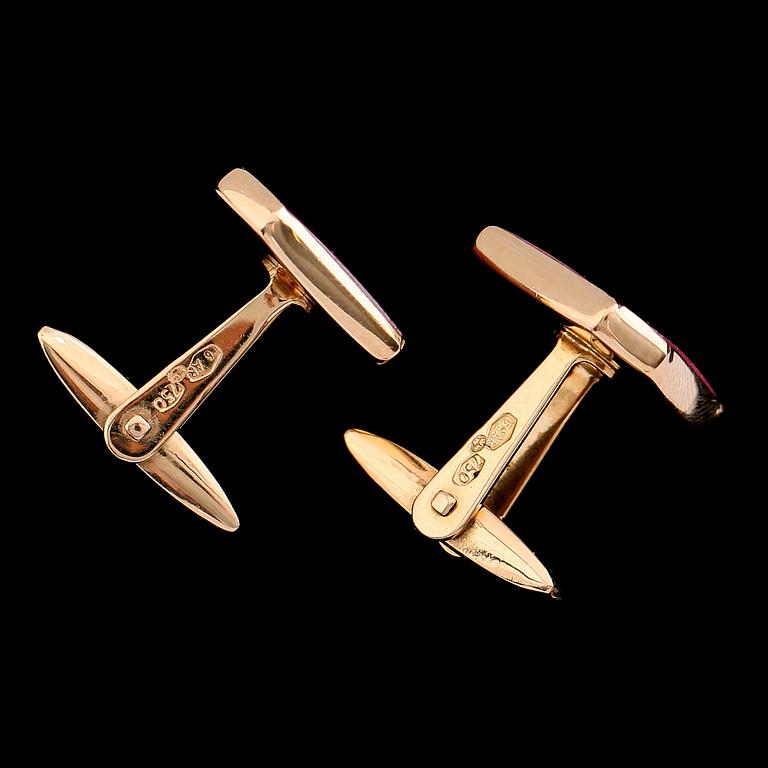 MANSCHETTKNAPPAR, 1 par,m 18 k guld, med rosa stenar. Total vikt ca 12 gram.