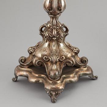 A pair of barocque style nine lights candelabra, silver plate, 20th Century.