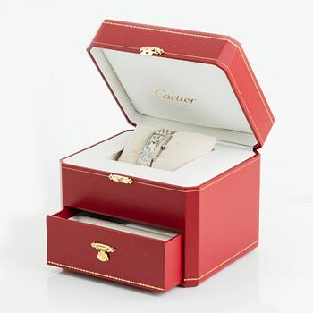 Cartier damarmbandsur "Tank Américane" 18K vitguld med runda briljantslipade diamanter.