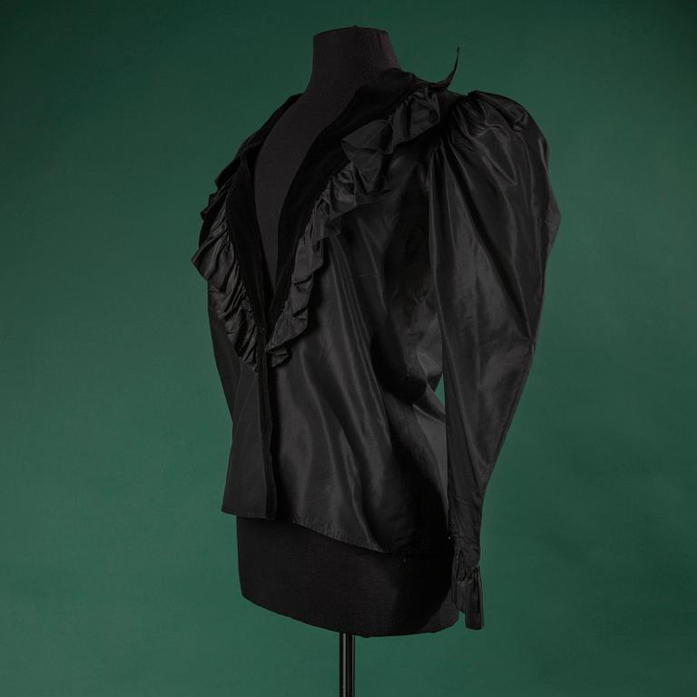 A blouse by YVES SAINT LAURENT.