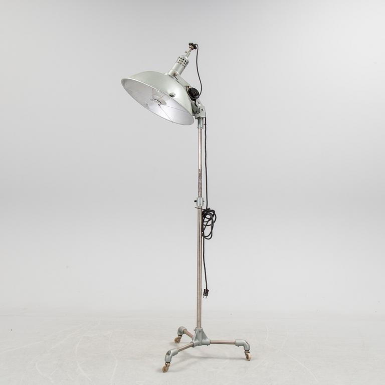 A German metal floor light from the mid 20th century.