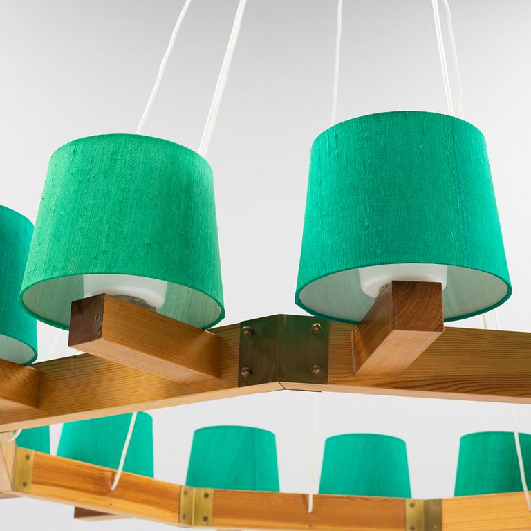 A pine 16-light chandelier, Luxus, Vittsjö.