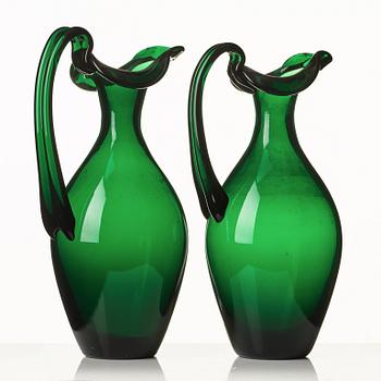Edward Hald, two emerald green claret jugs, Sandvik's glassworks, Sweden ca 1929, model HS 1021.