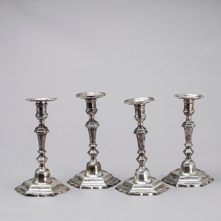 Two simular pairs of candlesticks, two marked Barde, Geneve 18th century, two with later marks.