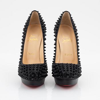 Christian Louboutin, a pair of black leather and studs pumps, size 36 1/2.