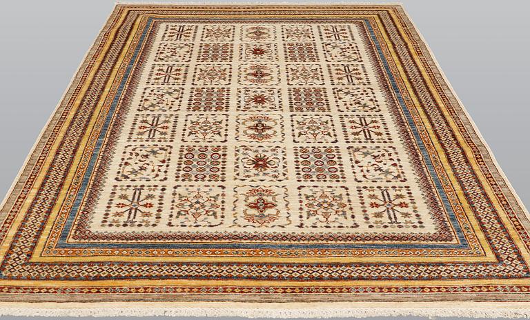 An Anatolian carpet, c 253 x 172 cm.