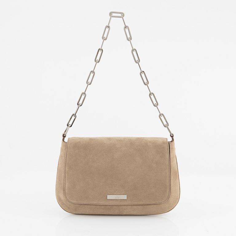 Gucci, a suede handbag.