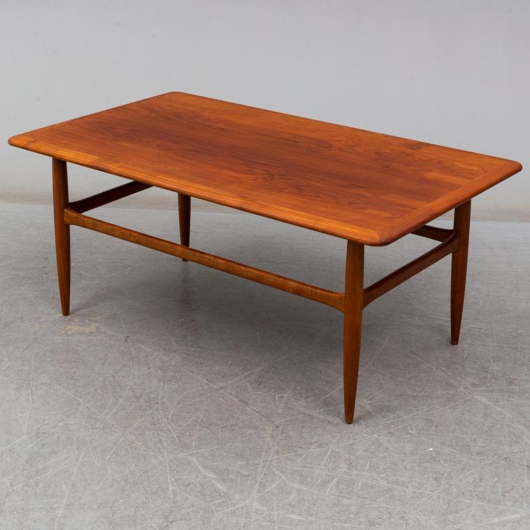 a teak coffee table from Denmark in the second half of the 20th century.