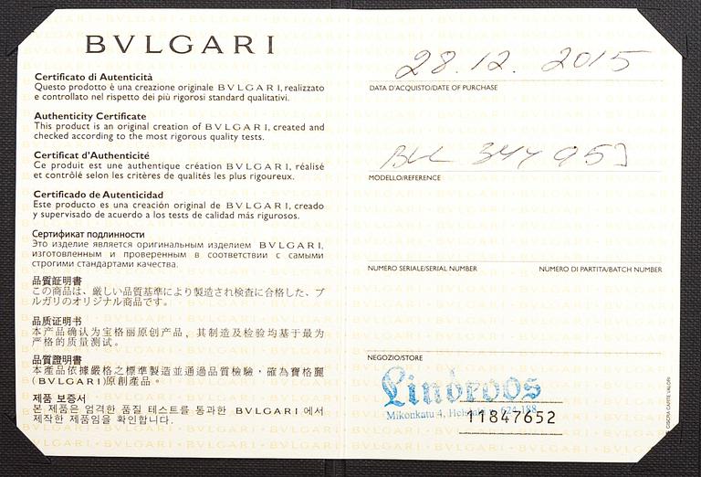 BULGARI, An 18K gold ring "Parentesi" with a green quartz and ca. 0.70 ct of  brilliant cut diamonds in total.