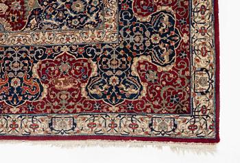A semi-antique Benlian Tabriz carpet, signed Jabarzade, c. 416 x 308 cm.