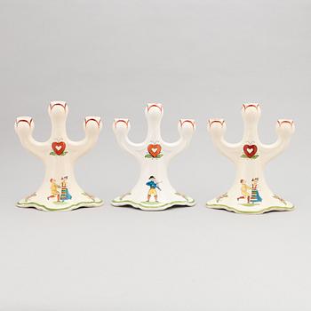 A set of three 'Daladansen' flintware candelabra from Rörstrand, Art Nouveau, early 20th Century.