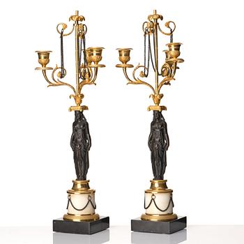 A pair of late Gustavian circa 1800 three-light candelabra, attributed to F L Rung.