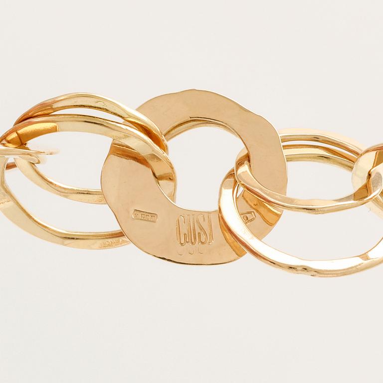 An 18K gold necklace by Cusi Italy.