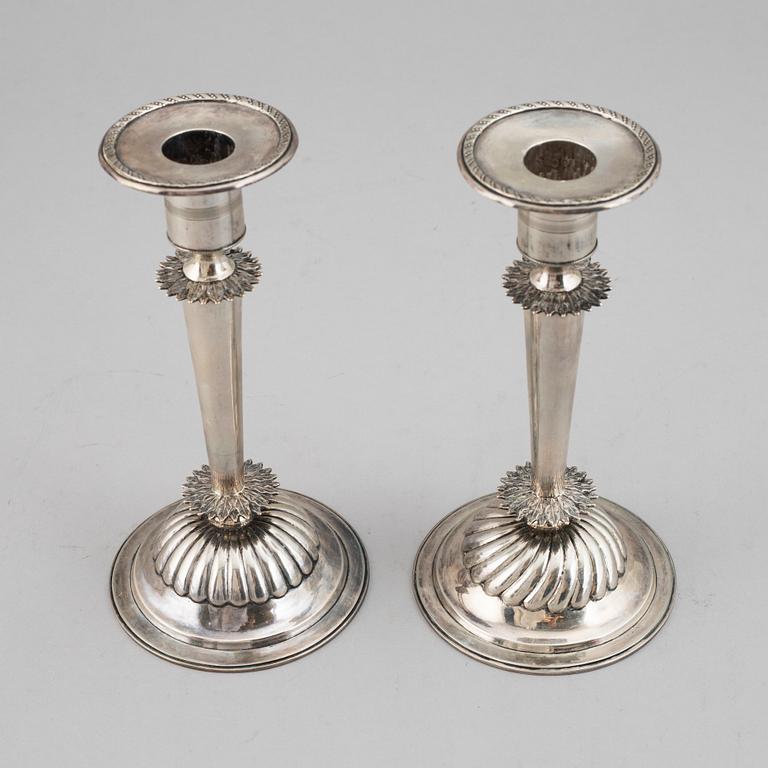 A pair of Empire silver candle sticks, 1823.