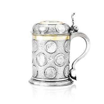 190. A German 18th century parcel-gilt silver coin-tankard, mark of Johann Friedrich Beyer, Schweidnitz (1736-1775).