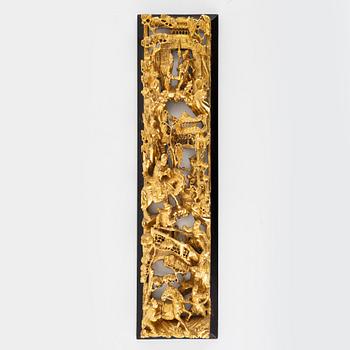 A gilded wooden relief, China, 20th century.