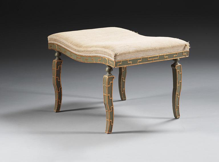 A Ture Ryberg stool, lacquered in olive green.